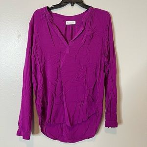 Purple, wrinkly from packing, still in good condition